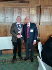 New President Mike Woodward (left) wearing Chain of Office presented by past President Tony Rudd