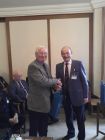 Keith Banks presents an award to the 2016 Golf Runner-up,<br />CHRIS SIMS